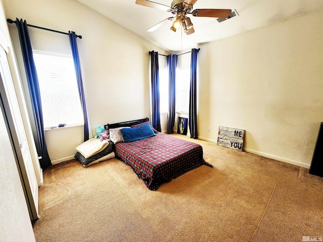 298 Fallen Leaf Ln, Fernley, NV 89408 - bedroom featuring multiple windows, carpet floors, ceiling fan, and baseboards