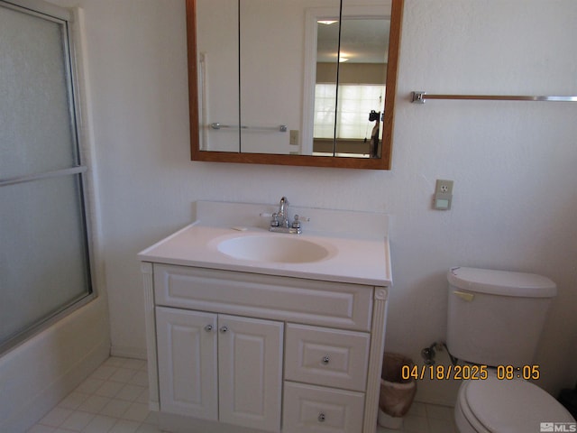 20 Cherry Ln, Yerington, NV 89447 - full bathroom featuring toilet, vanity, combined bath / shower with glass door, and tile patterned flooring