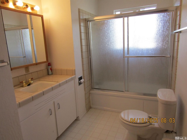 20 Cherry Ln, Yerington, NV 89447 - bathroom with toilet, vanity, and combined bath / shower with glass door