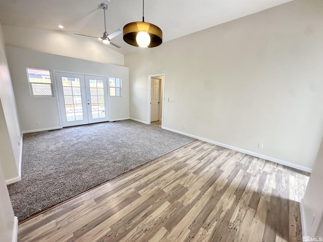 520 E Taylor St, Reno, NV 89502 - unfurnished room featuring french doors, a ceiling fan, baseboards, carpet floors, and high vaulted ceiling