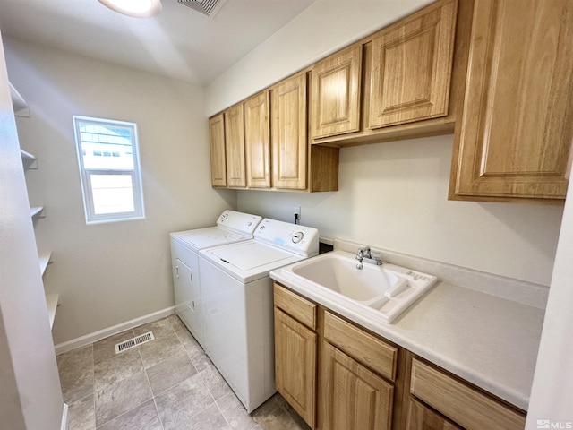 520 E Taylor St, Reno, NV 89502 - laundry area with cabinet space, washing machine and clothes dryer, and baseboards