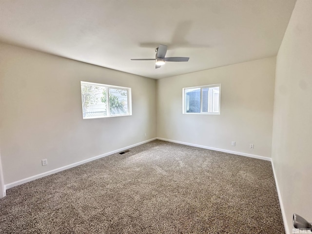 520 E Taylor St, Reno, NV 89502 - unfurnished room featuring a ceiling fan, dark carpet, and baseboards