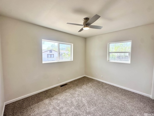 520 E Taylor St, Reno, NV 89502 - spare room featuring plenty of natural light, carpet floors, a ceiling fan, and baseboards