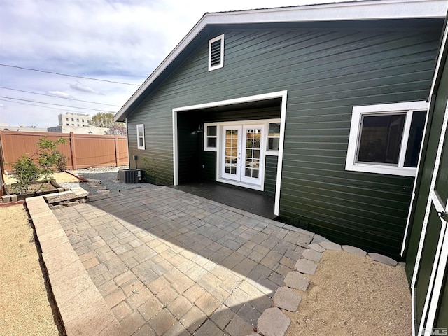 520 E Taylor St, Reno, NV 89502 - back of property with french doors, a patio area, fence, and cooling unit