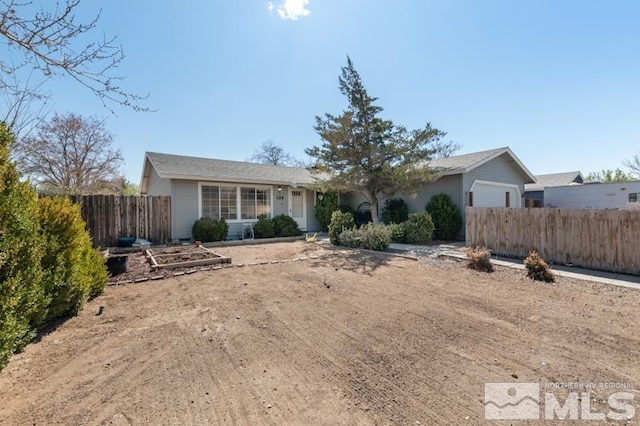 324 Occidental Dr, Dayton, NV 89403 - view of front of home featuring fence and a garage