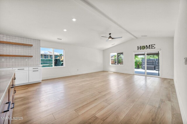 1144 Spruce Meadows Dr, Sparks, NV 89441 - unfurnished living room featuring ceiling fan, light wood finished floors, lofted ceiling, and recessed lighting