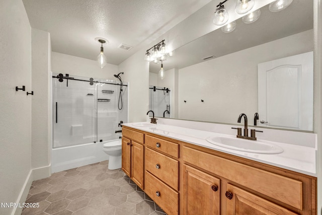 1144 Spruce Meadows Dr, Sparks, NV 89441 - full bath with shower / bath combination with glass door, double vanity, tile patterned flooring, and a textured ceiling