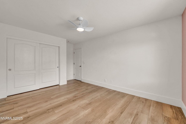 1144 Spruce Meadows Dr, Sparks, NV 89441 - unfurnished bedroom with a closet, light wood-type flooring, and ceiling fan