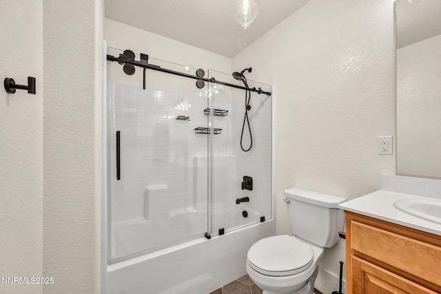 1144 Spruce Meadows Dr, Sparks, NV 89441 - full bathroom featuring vanity, bath / shower combo with glass door, and a textured wall