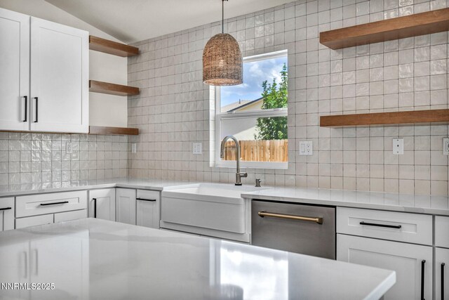 1144 Spruce Meadows Dr, Sparks, NV 89441 - kitchen with open shelves, backsplash, white cabinetry, and vaulted ceiling