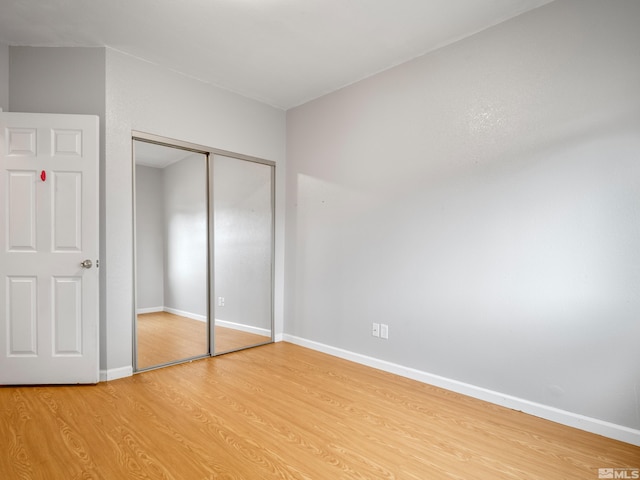 1308 Brooke Way, Gardnerville, NV 89410 - unfurnished bedroom with light wood-style floors, baseboards, and a closet