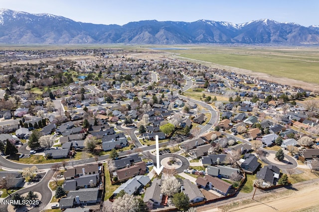 1774 Evergreen Ct, Minden, NV 89423 - aerial overview of property's location with nearby suburban area and a mountain backdrop