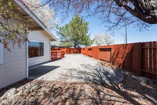 1774 Evergreen Ct, Minden, NV 89423 - fenced backyard with a patio