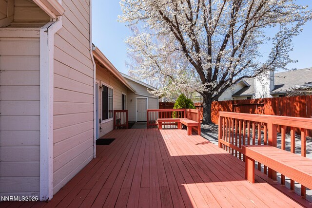 1774 Evergreen Ct, Minden, NV 89423 - wooden terrace with a fenced backyard