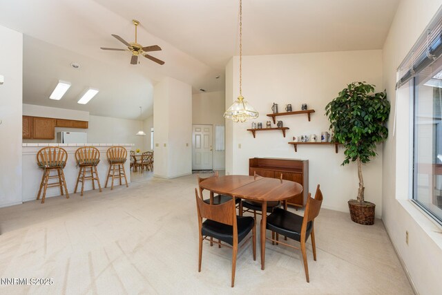 1774 Evergreen Ct, Minden, NV 89423 - dining room featuring light carpet, healthy amount of natural light, a ceiling fan, and high vaulted ceiling