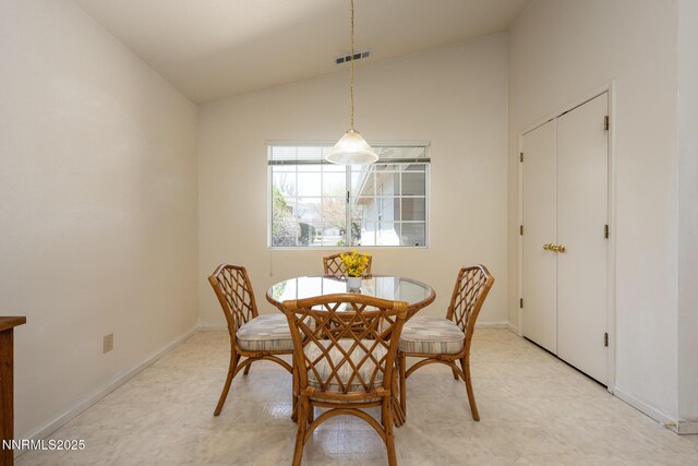 1774 Evergreen Ct, Minden, NV 89423 - dining space with vaulted ceiling and light floors