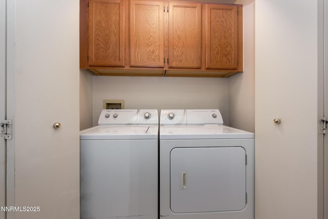 1774 Evergreen Ct, Minden, NV 89423 - laundry room featuring washing machine and dryer and cabinet space