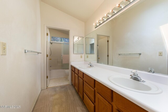 1774 Evergreen Ct, Minden, NV 89423 - full bath featuring double vanity, vaulted ceiling, and  shower combination