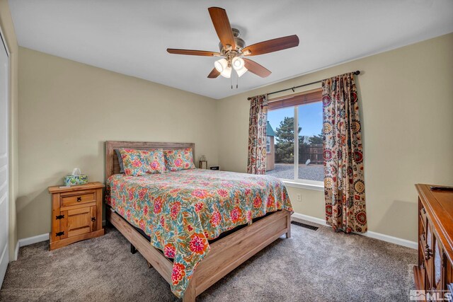 534 Dutch Oven Ct, Fernley, NV 89408 - bedroom with carpet floors, baseboards, and a ceiling fan