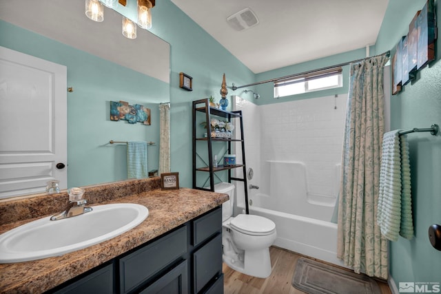 534 Dutch Oven Ct, Fernley, NV 89408 - bathroom with vanity, shower / tub combo with curtain, wood finished floors, and toilet