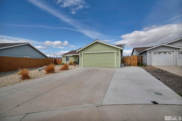 534 Dutch Oven Ct, Fernley, NV 89408 - ranch-style home featuring driveway, fence, and an attached garage