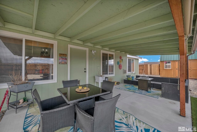 534 Dutch Oven Ct, Fernley, NV 89408 - view of patio / terrace featuring an outdoor living space, fence, and outdoor dining area