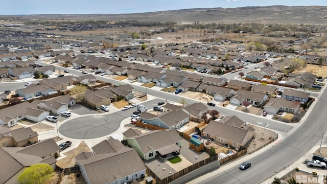 534 Dutch Oven Ct, Fernley, NV 89408 - aerial view of property and surrounding area featuring nearby suburban area and mountains