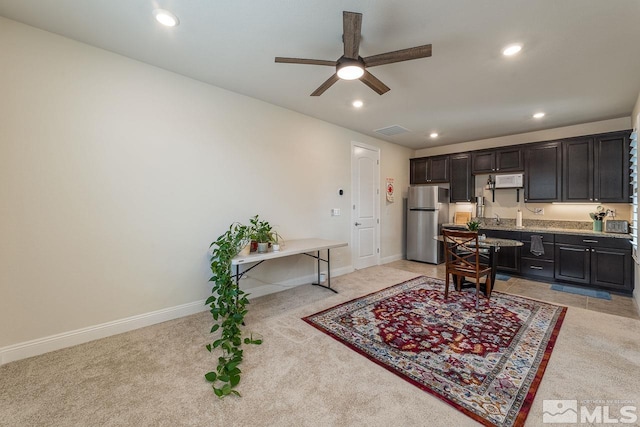 1023 Carico Valley Pl, Sparks, NV 89441 - kitchen featuring freestanding refrigerator, light colored carpet, a ceiling fan, recessed lighting, and baseboards