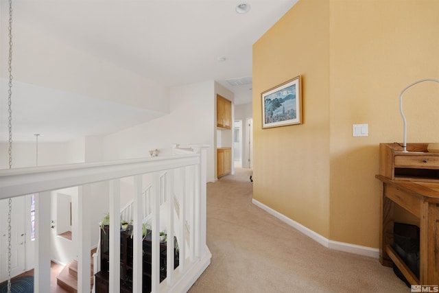 2761 Cheshire, Reno, NV 89523 - corridor with light colored carpet, baseboards, and an upstairs landing