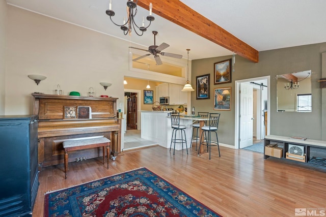 2640 Emily St, Reno, NV 89503 - living area with ceiling fan, light wood-style floors, beam ceiling, and a chandelier