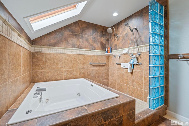 2640 Emily St, Reno, NV 89503 - full bathroom with a skylight, a tile shower, vaulted ceiling, and a jetted tub