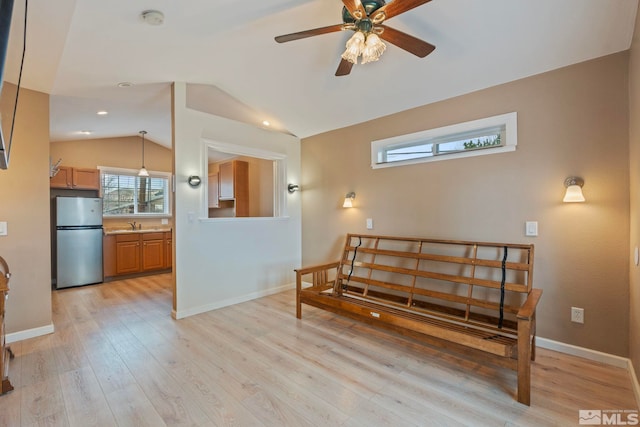 2640 Emily St, Reno, NV 89503 - interior space featuring lofted ceiling, ceiling fan, light wood finished floors, and baseboards