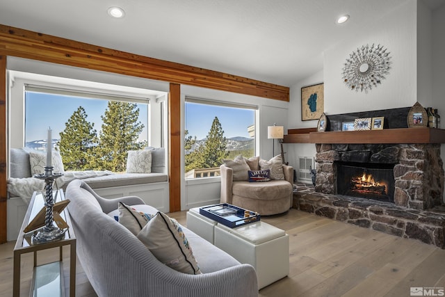 400 Fairview Blvd Unit 8, Incline Village, NV 89451 - living area featuring a fireplace, hardwood / wood-style floors, recessed lighting, lofted ceiling, and a mountain view