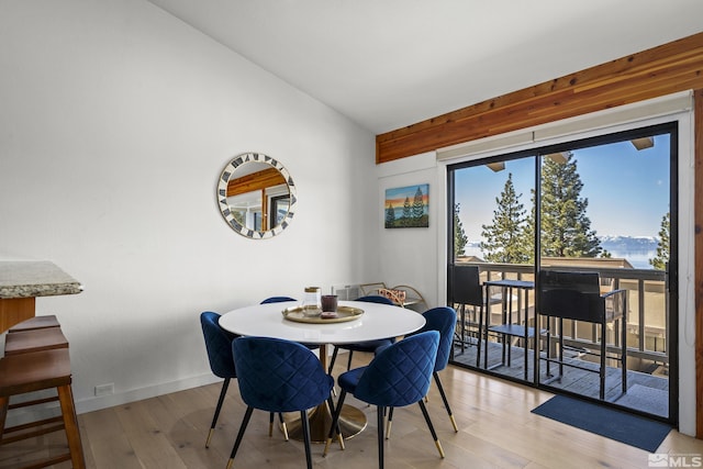400 Fairview Blvd Unit 8, Incline Village, NV 89451 - dining space with light wood-style flooring, vaulted ceiling, and baseboards
