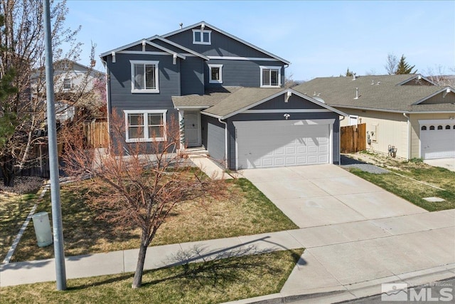 7753 Tulear St, Reno, NV 89506 - traditional home with fence, driveway, and an attached garage