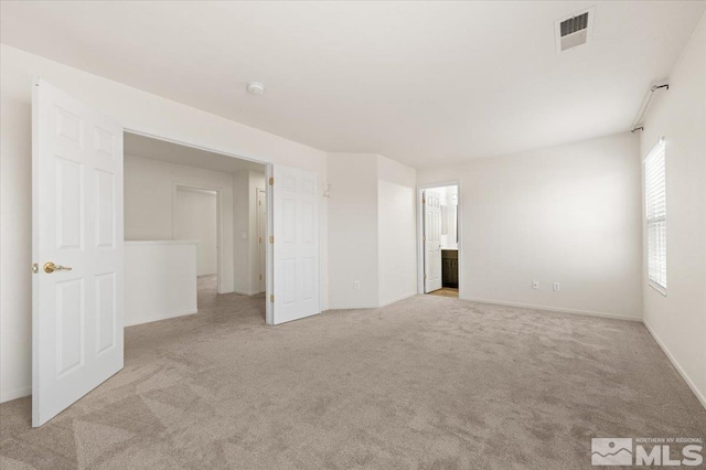 7753 Tulear St, Reno, NV 89506 - carpeted empty room featuring baseboards