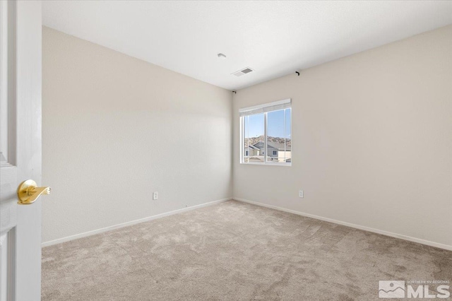 7753 Tulear St, Reno, NV 89506 - empty room with carpet flooring and baseboards