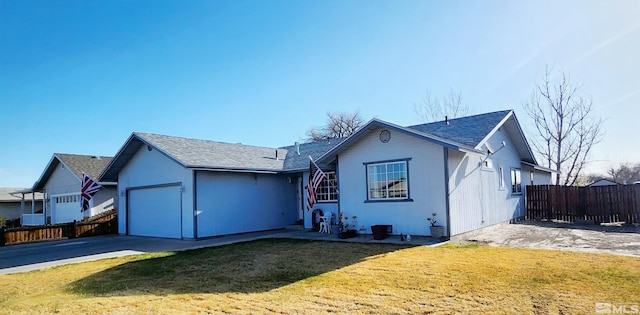 495 Burntwood St, Fallon, NV 89406 - ranch-style home with roof with shingles, a garage, and driveway