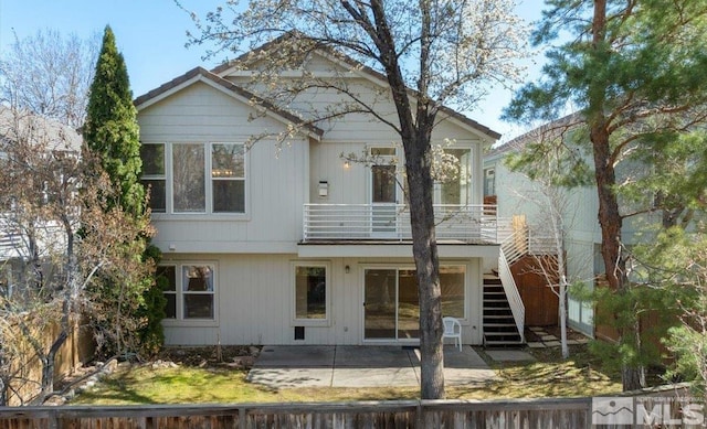 709 Caughlin, Reno, NV 89519 - view of front of property with stairway, a patio area, and fence