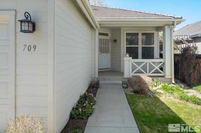 709 Caughlin, Reno, NV 89519 - property entrance with a tile roof