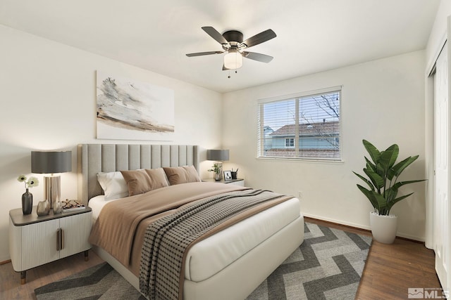 4251 Furgerson Ranch Rd, Carson City, NV 89701 - bedroom with dark wood-style flooring, baseboards, and ceiling fan