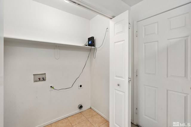 4251 Furgerson Ranch Rd, Carson City, NV 89701 - laundry room with hookup for a washing machine, hookup for an electric dryer, light tile patterned floors, and baseboards
