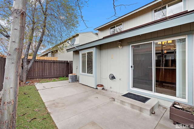 4251 Furgerson Ranch Rd, Carson City, NV 89701 - back of property featuring fence, a patio area, and central AC unit