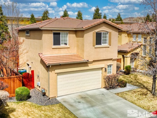 2078 Tivoli, Sparks, NV 89434 - view of front of property with an attached garage, stucco siding, fence, concrete driveway, and a tile roof