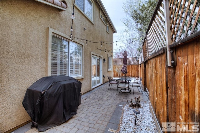 2078 Tivoli, Sparks, NV 89434 - view of patio / terrace featuring a grill, fence, and outdoor dining area