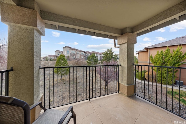 6850 Sharlands Ave # W2137, Reno, NV 89523 - balcony featuring a residential view and cooling unit