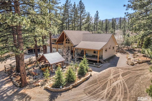 16375 Callahan Rd, Reno, NV 89511 - back of house featuring roof with shingles and covered porch