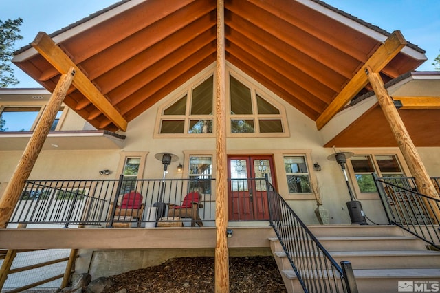 16375 Callahan Rd, Reno, NV 89511 - back of house with stucco siding, french doors, and a porch