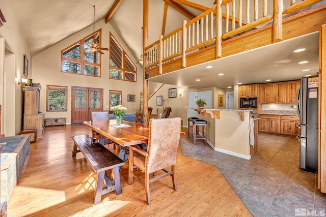 16375 Callahan Rd, Reno, NV 89511 - dining area featuring high vaulted ceiling, beamed ceiling, light wood-style flooring, ceiling fan, and recessed lighting