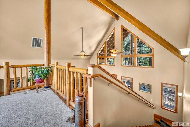16375 Callahan Rd, Reno, NV 89511 - stairway featuring ceiling fan, beam ceiling, carpet flooring, and high vaulted ceiling